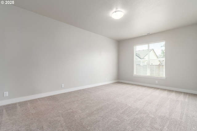 3237 Wildflower Dr, Springfield, OR 97478 - carpeted spare room featuring baseboards