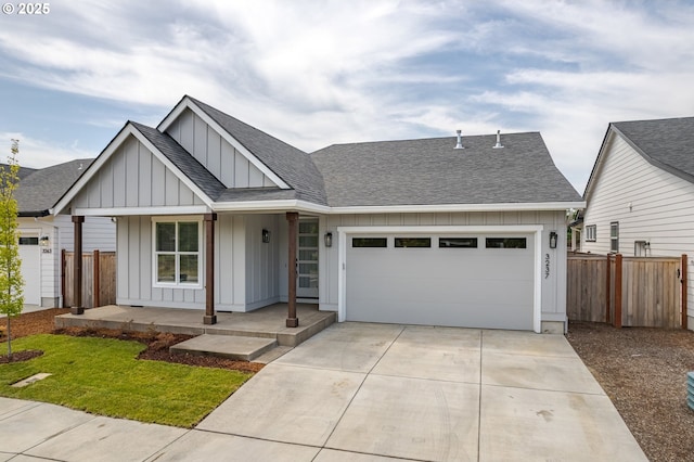 3237 Wildflower Dr, Springfield, OR 97478 - modern farmhouse style home with board and batten siding, driveway, covered porch, roof with shingles, and a garage