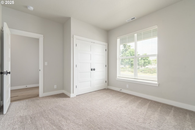 3237 Wildflower Dr, Springfield, OR 97478 - unfurnished bedroom with baseboards and carpet