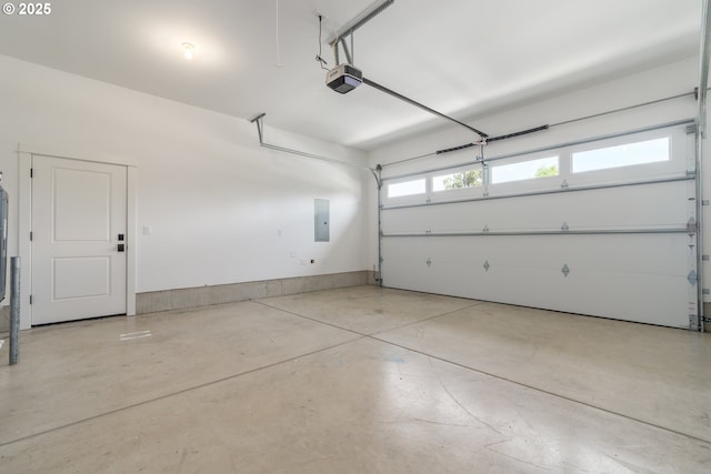 3237 Wildflower Dr, Springfield, OR 97478 - garage featuring electric panel and a garage door opener