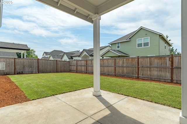 3237 Wildflower Dr, Springfield, OR 97478 - fenced backyard with a patio and a residential view