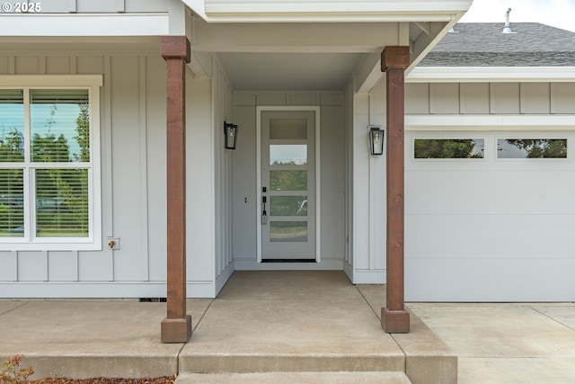 3237 Wildflower Dr, Springfield, OR 97478 - view of exterior entry featuring board and batten siding and a shingled roof