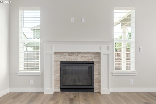 3237 Wildflower Dr, Springfield, OR 97478 - detailed view of wood finished floors and a glass covered fireplace
