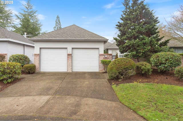 view of front of property with an outbuilding and a garage