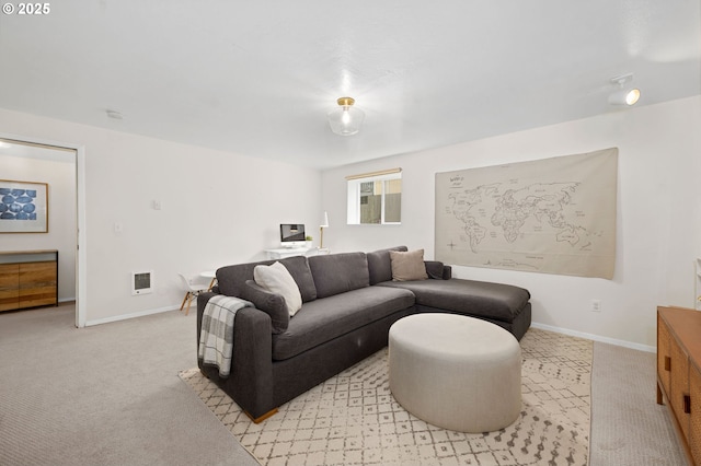 living room featuring light carpet