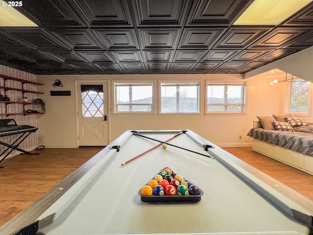 recreation room with wood finished floors, baseboards, and billiards