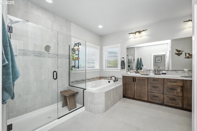 16949 SW Appledale Rd, Beaverton, OR 97007 - bathroom featuring a bath, double vanity, a stall shower, tile patterned floors, and recessed lighting
