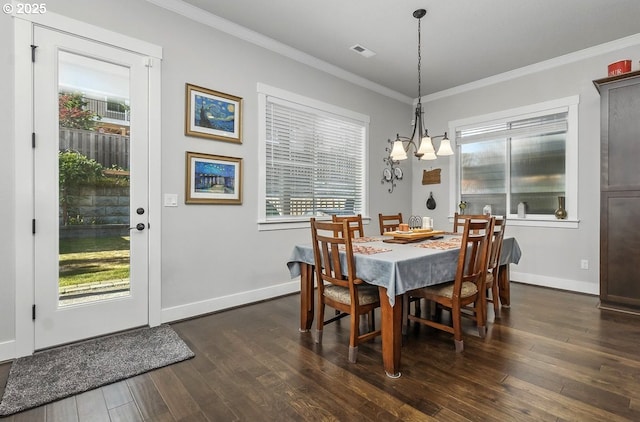 16949 SW Appledale Rd, Beaverton, OR 97007 - dining space with ornamental molding, dark wood-style flooring, plenty of natural light, and a chandelier