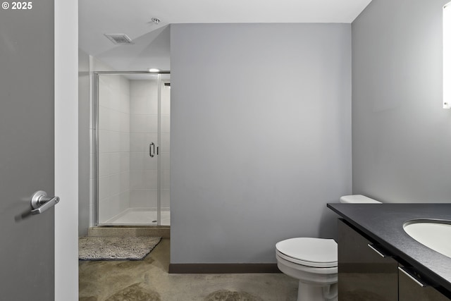 bathroom featuring vanity, toilet, an enclosed shower, and concrete floors