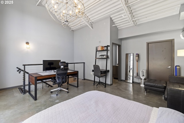 bedroom featuring a towering ceiling and a notable chandelier