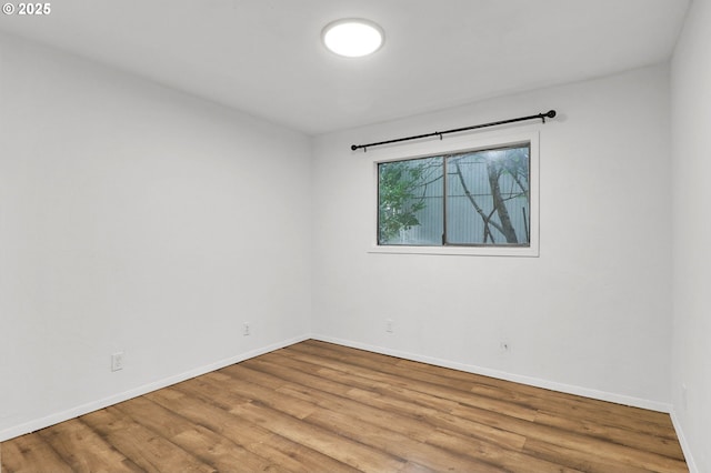 4021 N Clarey St, Eugene, OR 97402 - spare room featuring wood finished floors and baseboards