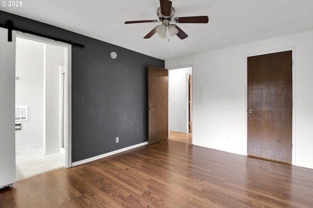 4021 N Clarey St, Eugene, OR 97402 - unfurnished bedroom featuring wood finished floors, a ceiling fan, and baseboards