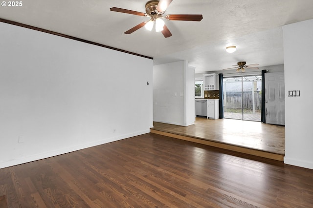 4021 N Clarey St, Eugene, OR 97402 - unfurnished living room with ceiling fan, wood finished floors, and baseboards