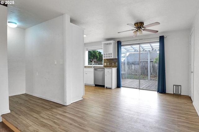 4021 N Clarey St, Eugene, OR 97402 - spare room featuring ceiling fan, light wood-style floors, a sink, and baseboards