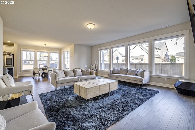 living room with wood-type flooring