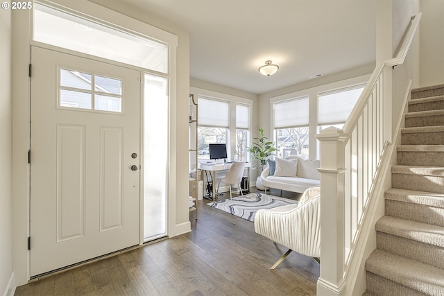 foyer with hardwood / wood-style flooring