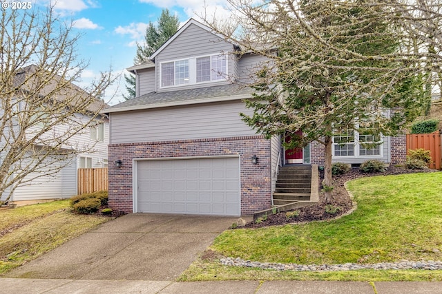 traditional-style home featuring fence, driveway, a front lawn, a garage, and brick siding