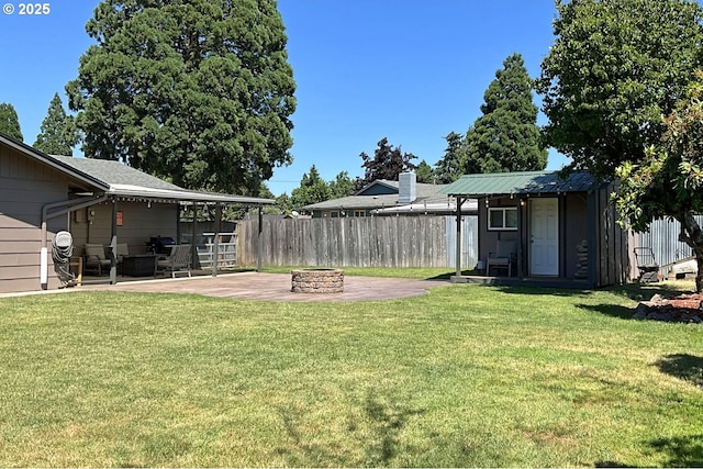 1082 Dondea St, Springfield, OR 97478 - view of yard featuring a patio area and a fire pit