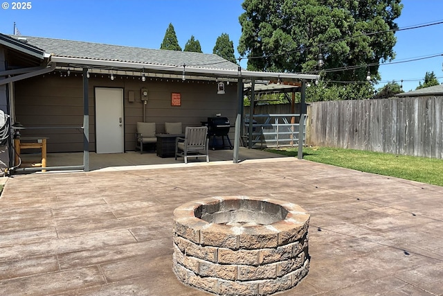 1082 Dondea St, Springfield, OR 97478 - view of patio / terrace featuring a fire pit and a grill
