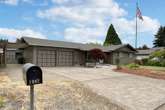 1082 Dondea St, Springfield, OR 97478 - ranch-style home featuring a garage and driveway
