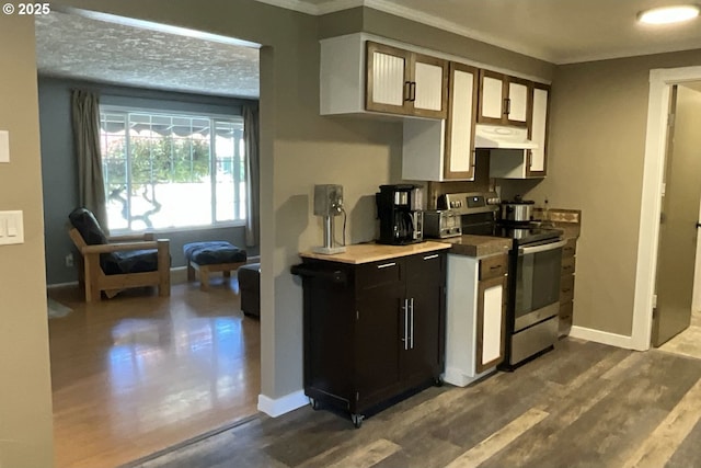 1082 Dondea St, Springfield, OR 97478 - kitchen featuring stainless steel range with electric stovetop, premium range hood, dark wood-style flooring, ornamental molding, and light countertops