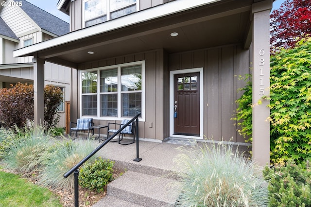 63115 NE De Haviland St, Bend, OR 97701 - view of exterior entry featuring a porch and board and batten siding
