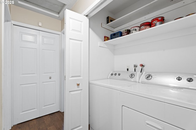 11255 SW Springwood Dr, Portland, OR 97223 - washroom with washing machine and clothes dryer and dark wood-type flooring