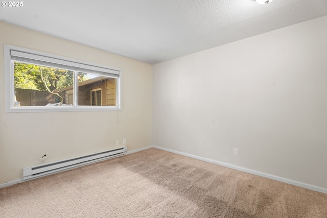 11255 SW Springwood Dr, Portland, OR 97223 - carpeted spare room featuring a baseboard heating unit and baseboards