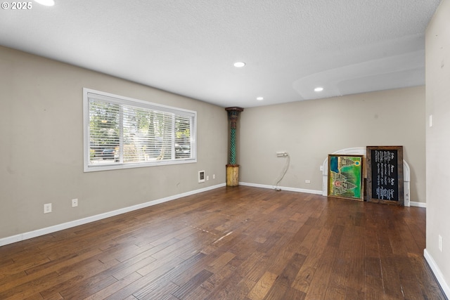 11255 SW Springwood Dr, Portland, OR 97223 - spare room with hardwood / wood-style flooring, recessed lighting, and a textured ceiling