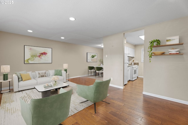 11255 SW Springwood Dr, Portland, OR 97223 - living room with wood finished floors and recessed lighting
