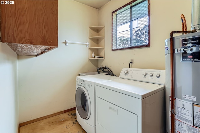 157 NE 11th Dr, Hillsboro, OR 97124 - clothes washing area featuring water heater, cabinet space, independent washer and dryer, and baseboards