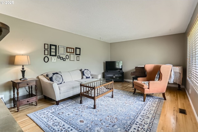 157 NE 11th Dr, Hillsboro, OR 97124 - living area with wood finished floors and baseboards