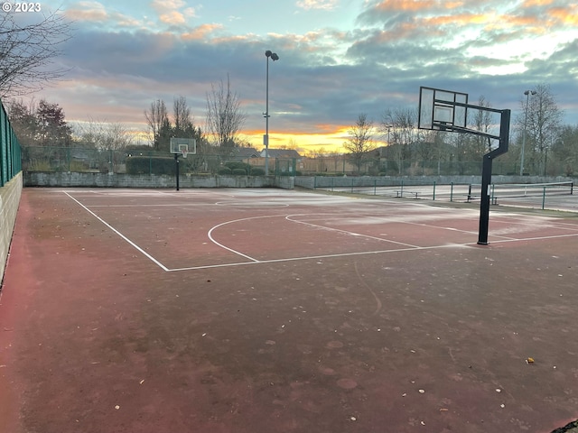 view of sport court with community basketball court and fence