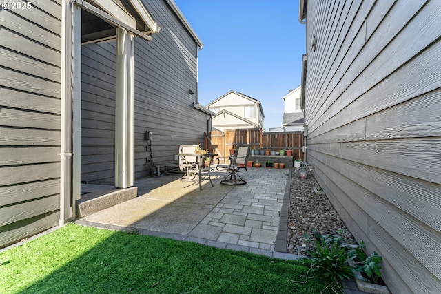 view of patio / terrace with fence