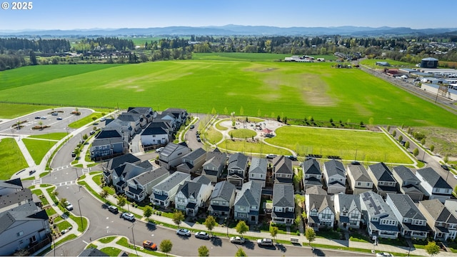 aerial view featuring a mountain view and a residential view