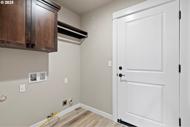 laundry room featuring baseboards, gas dryer hookup, washer hookup, light wood-type flooring, and electric dryer hookup