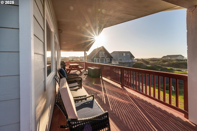 view of balcony at dusk