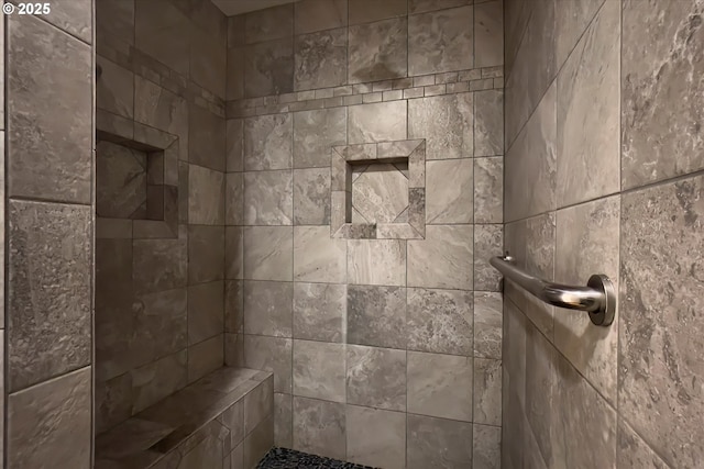 details featuring tiled shower