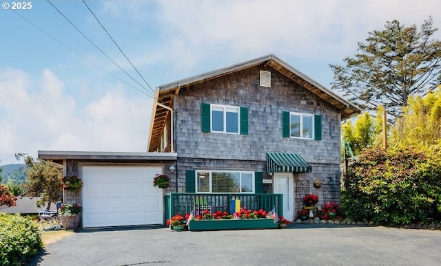 4345 Salem Ave, Neskowin, OR 97149 - view of front of property with a garage and asphalt driveway