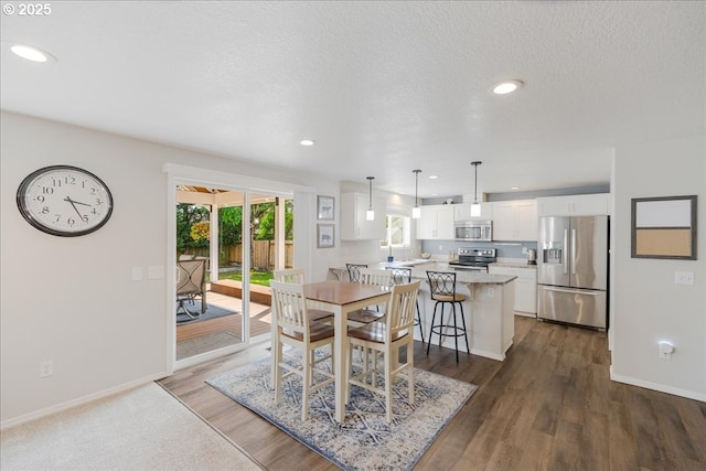 1133 7th St, Lafayette, OR 97127 - dining area with recessed lighting, dark wood finished floors, and a textured ceiling