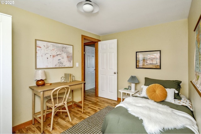 7335 SE 48th Ave, Portland, OR 97206 - bedroom featuring light wood-type flooring, baseboards, and an office area