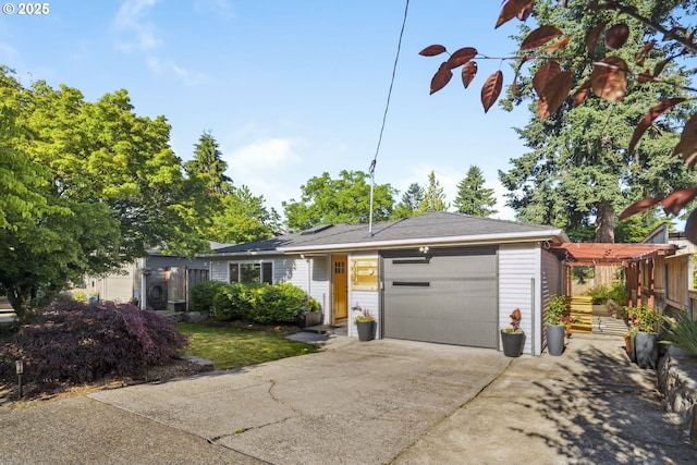 7335 SE 48th Ave, Portland, OR 97206 - ranch-style home with driveway and a garage