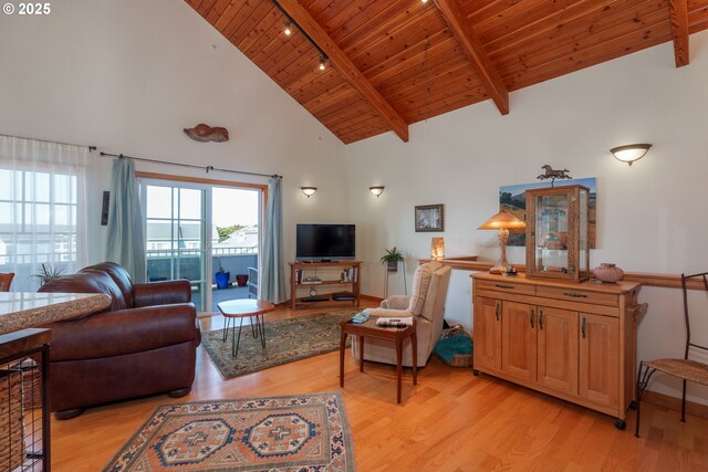 1327 Village Loop, Bandon, OR 97411 - living room with track lighting, wooden ceiling, beam ceiling, light wood finished floors, and high vaulted ceiling