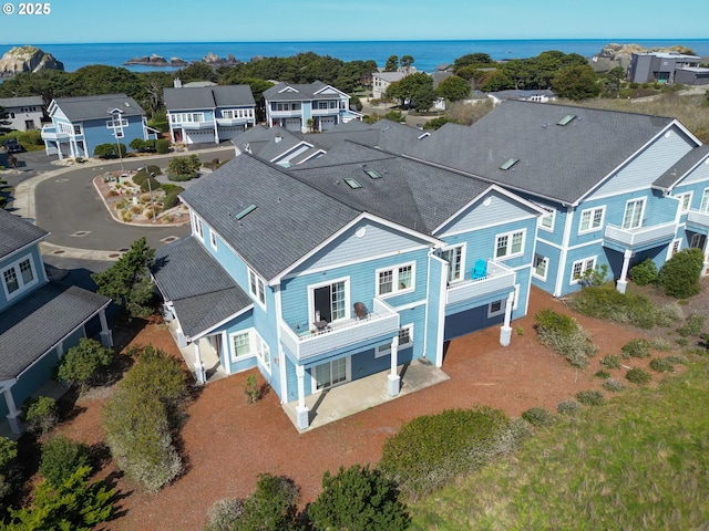 1327 Village Loop, Bandon, OR 97411 - birds eye view of property with a water view and a residential view