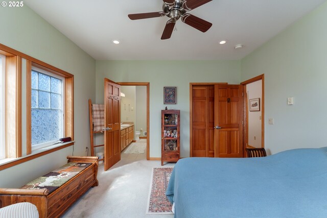 1327 Village Loop, Bandon, OR 97411 - bedroom with a closet, light carpet, recessed lighting, ensuite bath, and a ceiling fan