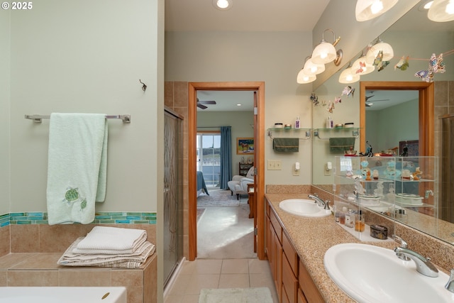1327 Village Loop, Bandon, OR 97411 - ensuite bathroom with tile patterned floors, ensuite bathroom, a sink, and a ceiling fan