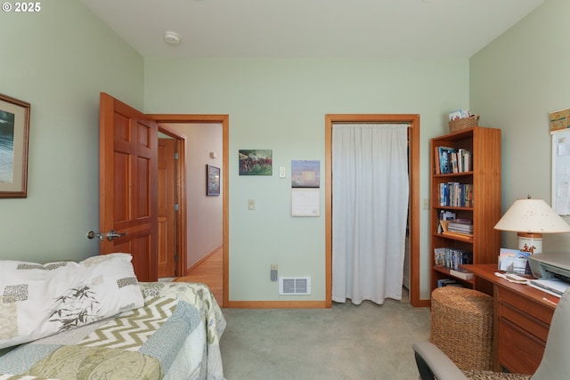 1327 Village Loop, Bandon, OR 97411 - bedroom featuring visible vents, baseboards, a closet, and carpet floors