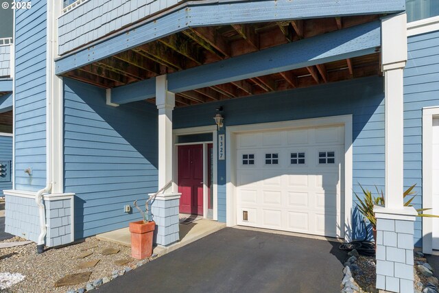 1327 Village Loop, Bandon, OR 97411 - property entrance with a garage