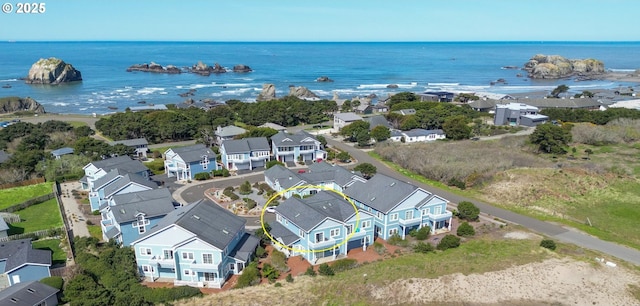 1327 Village Loop, Bandon, OR 97411 - drone / aerial view with a residential view and a water view