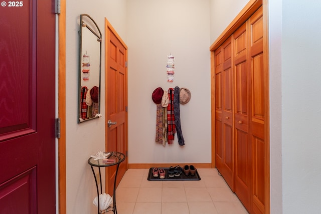 1327 Village Loop, Bandon, OR 97411 - entryway featuring baseboards and light tile patterned flooring
